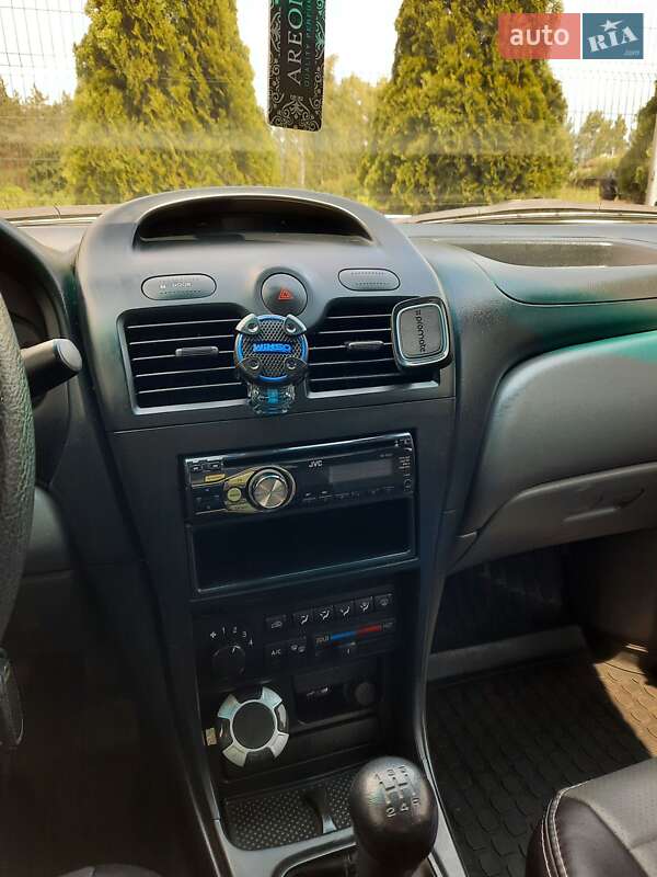 Седан Nissan Almera 2012 в Вараші