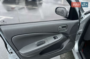 Седан Nissan Almera 2010 в 