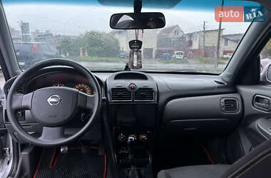 Седан Nissan Almera 2010 в 