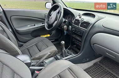 Седан Nissan Almera 2006 в  фото 33 Седан Nissan Almera 2006 в