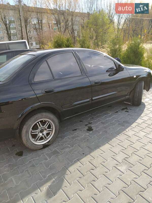 Седан Nissan Almera 2007 в Комарному