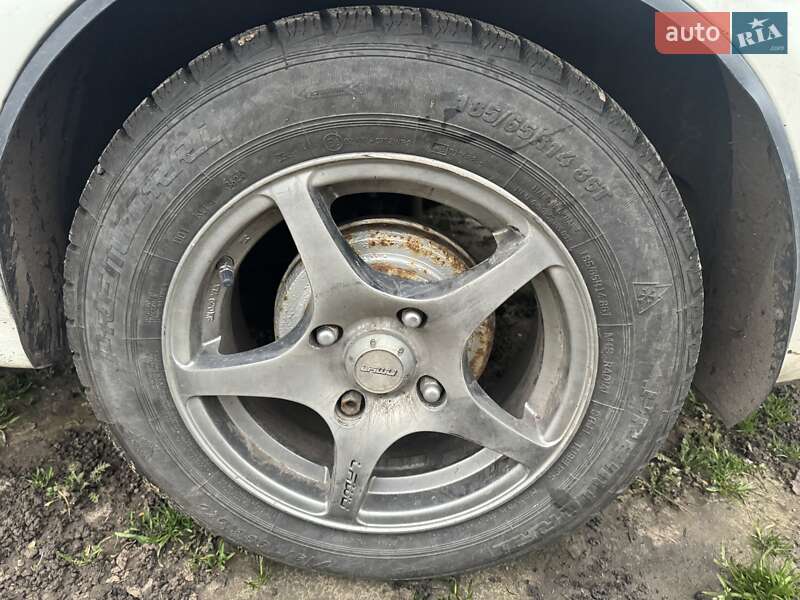 Седан Nissan Almera 2012 в Белогородке