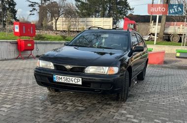 Хетчбек Nissan Almera 1998 в Ромнах