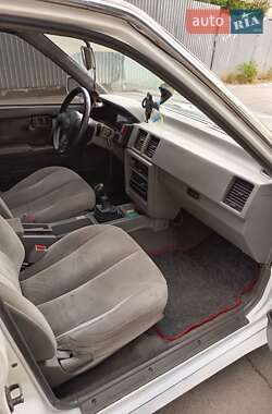 Седан Nissan Bluebird 1989 в 