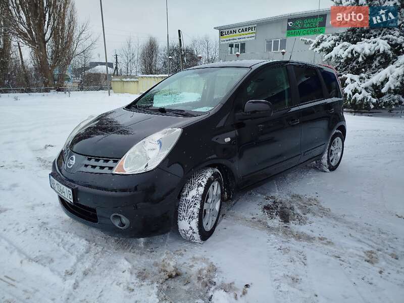 2008 Nissan Note, VIN SJNFAAE11U1259560:plate — фото 1 (autoria)