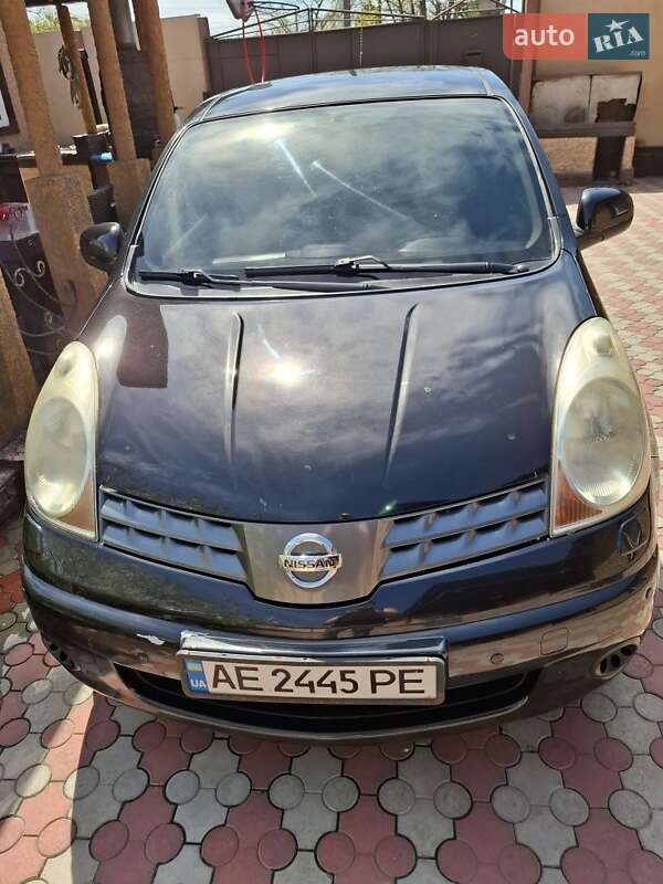 2007 Nissan Note, VIN SJNFAAE11U1237347:plate — фото 1 (autoria)