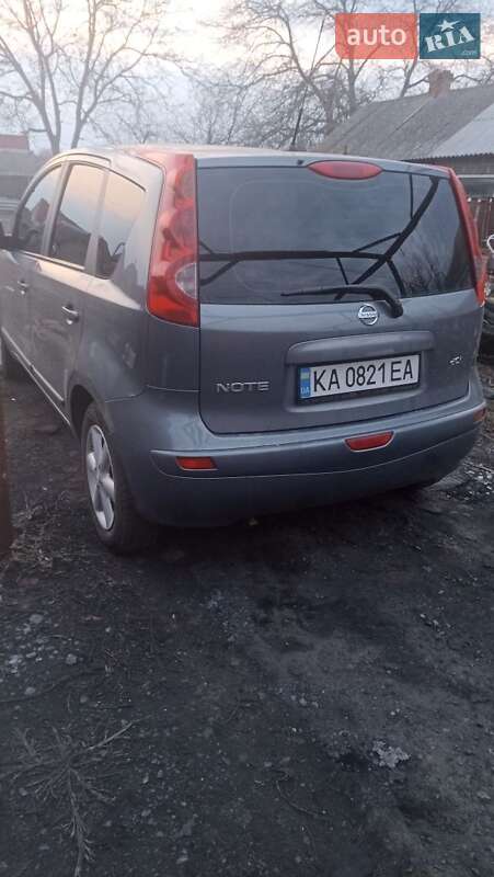2009 Nissan Note, VIN SJNFDAE11U1307811:plate — фото 1 (autoria)