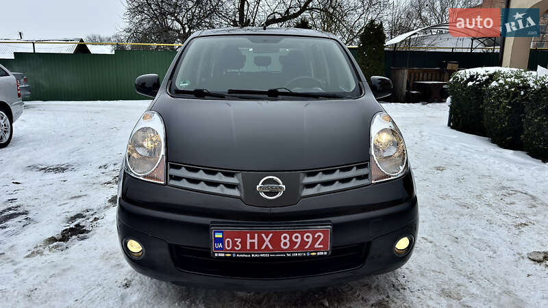2006 Nissan Note, VIN SJNFAAE11U1064392:plate — фото 1 (autoria)
