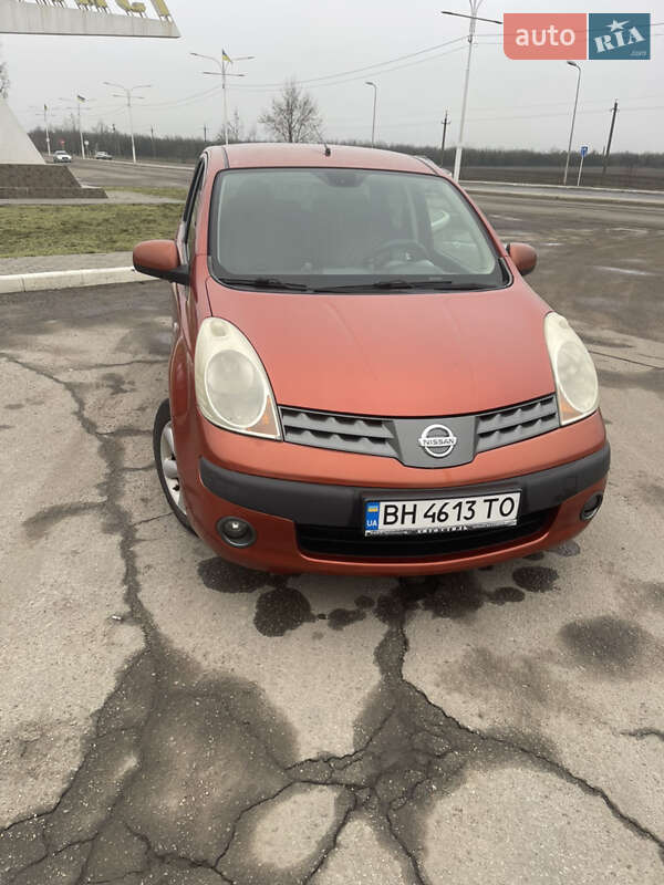 2006 Nissan Note, VIN SJNFAAE11U1072348:plate — фото 1 (autoria)
