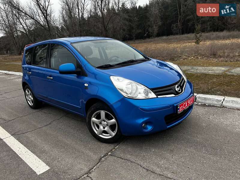 2011 Nissan Note, VIN SJNFCAE11U2122000:plate — фото 1 (autoria)