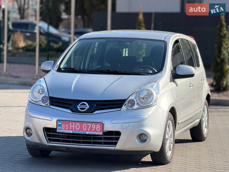 2011 Nissan Note, VIN SJNFAAE11U2147743:plate — фото 1 (autoria)