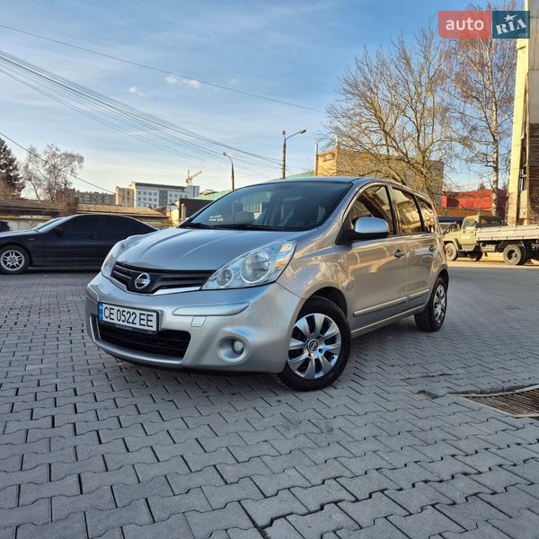 2011 Nissan Note, VIN SJNFDAE11U2111187:plate — фото 1 (autoria)