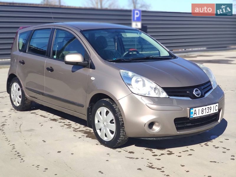 2010 Nissan Note, VIN SJNFAAE11U2096109:plate — фото 1 (autoria)