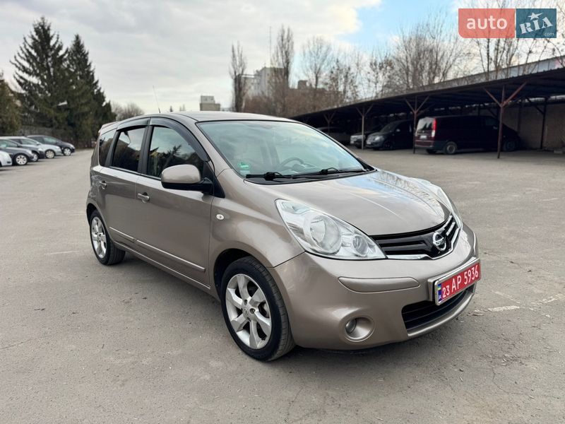 2009 Nissan Note, VIN SJNFCAE11U2029765:plate — фото 1 (autoria)