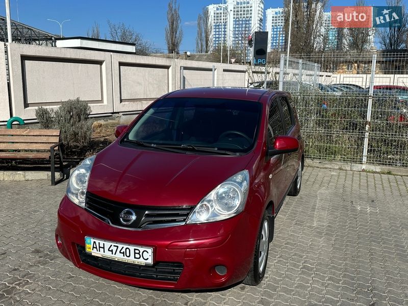 2011 Nissan Note, VIN SJNFAAE11U2124050:plate — фото 1 (autoria)