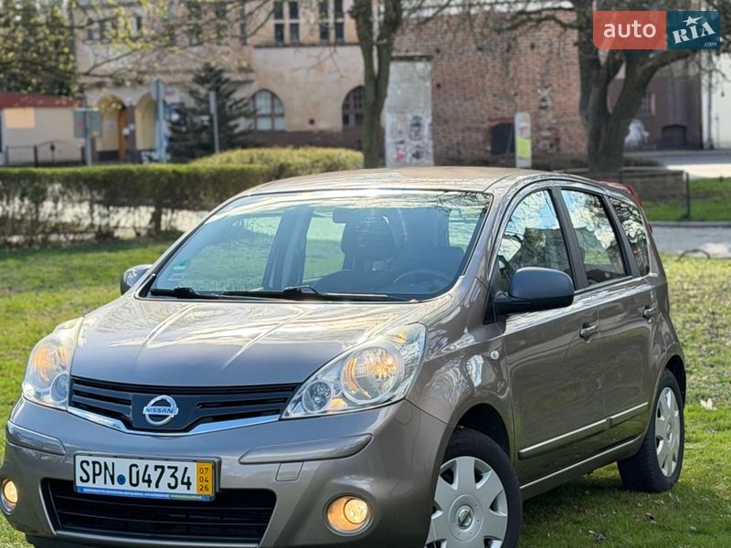 2009 Nissan Note, VIN SJNFCAE11U2038958:plate — фото 1 (autoria)