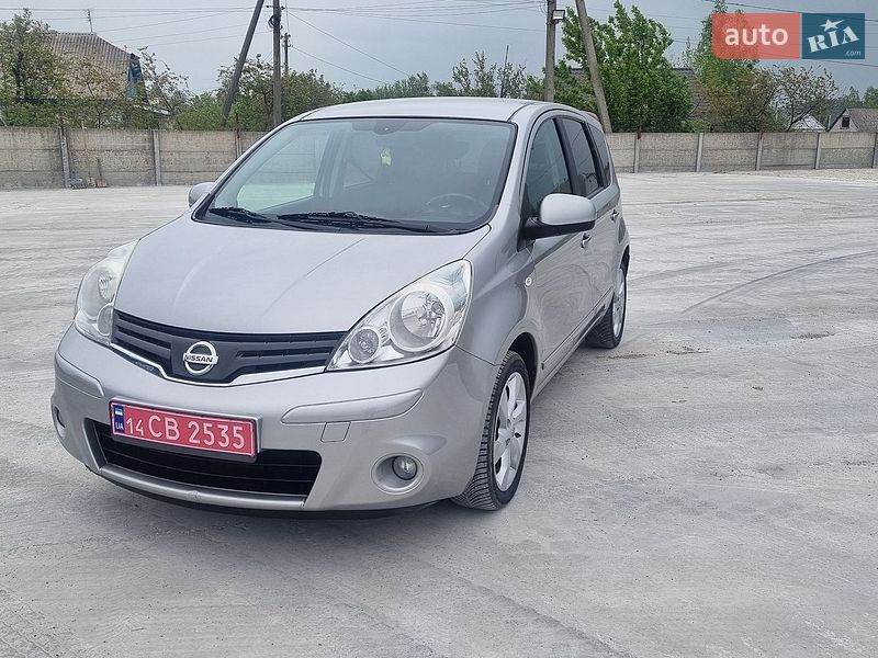 2010 Nissan Note, VIN SJNFAAE11U2081019:plate — фото 1 (autoria)