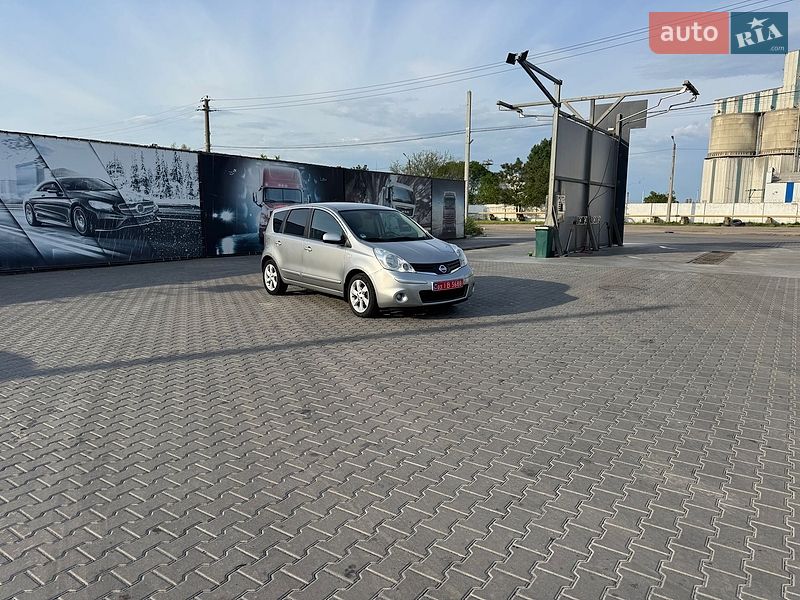 2010 Nissan Note, VIN SJNFCAE11U2069131:plate — фото 1 (autoria)