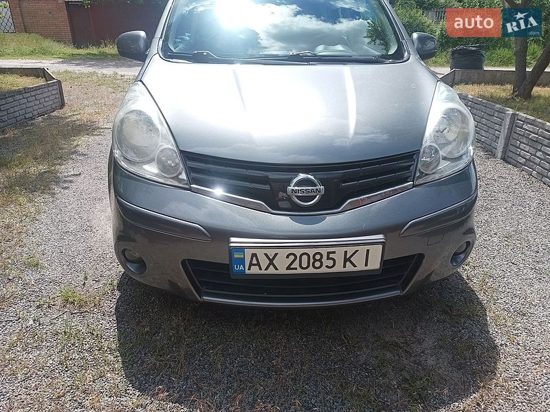 2013 Nissan Note, VIN SJNFAAE11U2182998:plate — фото 1 (autoria)