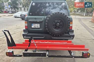 Внедорожник / Кроссовер Nissan Patrol 1998 в 