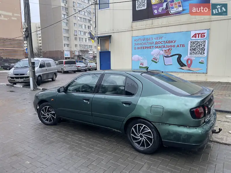 Nissan Primera 1999 VIN SJNFEAP11U0393714 фото оголошення 4 з 45