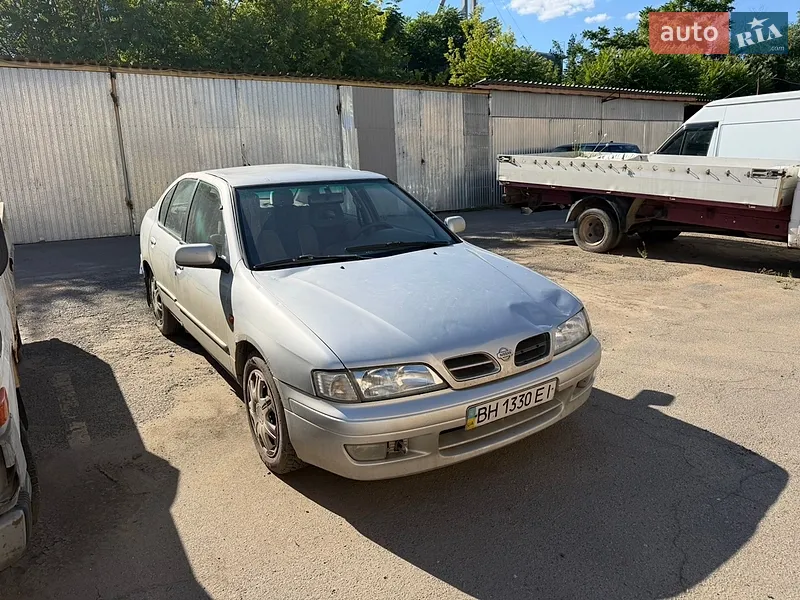 Nissan Primera 1999 VIN SJNFEAP11U0393714 фото оголошення 12 з 45