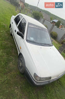Седан Nissan Sunny 1990 в 