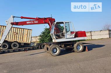 Екскаватор навантажувач O&K MH 5 1993 в 