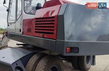 Колесный экскаватор O&K MH 1993 в 