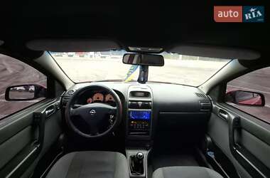 Купе Opel Astra 2003 в  фото 13 Купе Opel Astra 2003 в