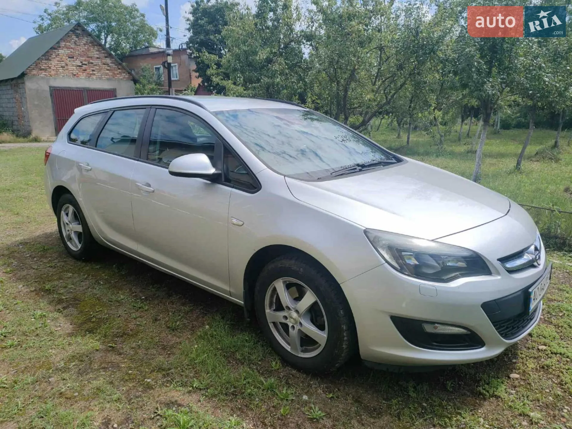 2014 Opel Astra - фото 1