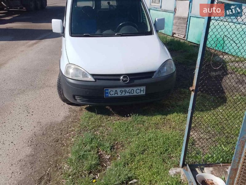 2011 Opel Combo, VIN W0L0XCF25B4125280:plate — фото 1 (autoria)