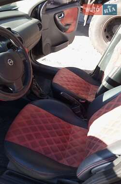 Хэтчбек Opel Corsa 2003 в  фото 24 Хэтчбек Opel Corsa 2003 в