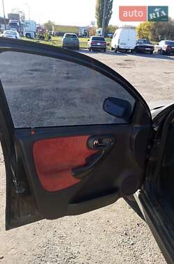 Хэтчбек Opel Corsa 2003 в  фото 35 Хэтчбек Opel Corsa 2003 в