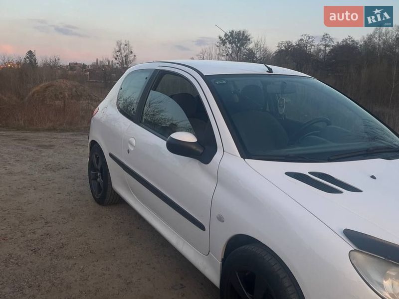 Хэтчбек Peugeot 206 2004 в Киеве фото 8 Хэтчбек Peugeot 206 2004 в Киеве