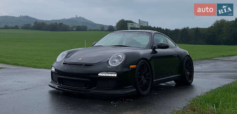 Купе Porsche 911 2010 в 