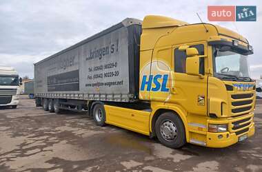 Тягач Scania R 360 2011 в 