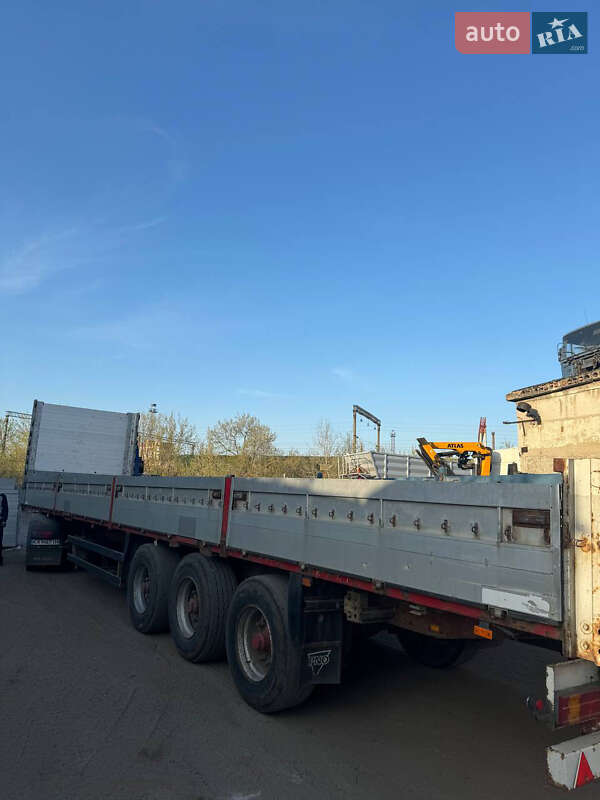Бортовой полуприцеп Schmitz Cargobull S01 2001 в 