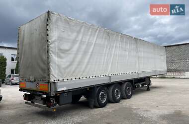Бортовой полуприцеп Schmitz Cargobull S01 2005 в 