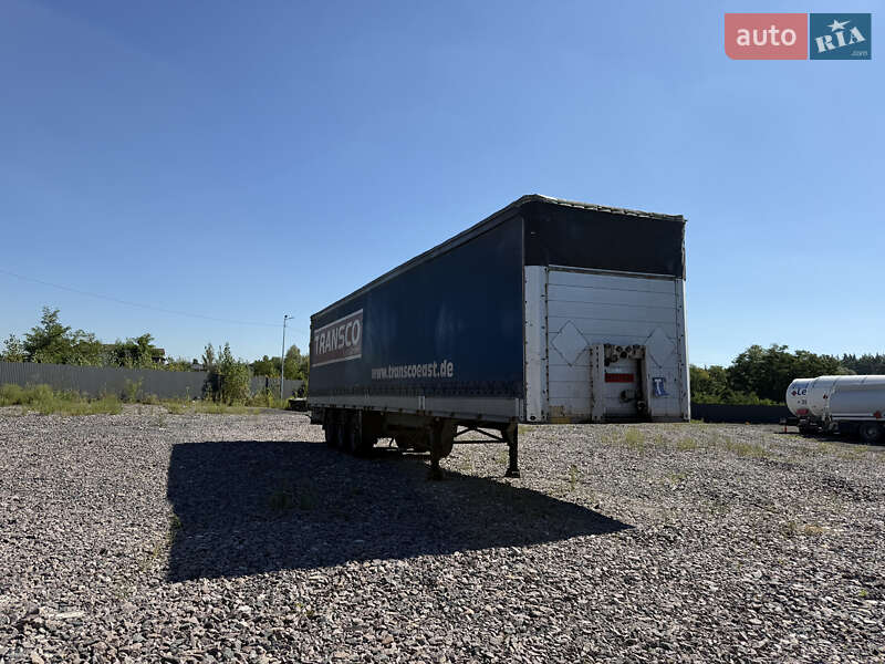 Бортовой полуприцеп Schmitz Cargobull S01 2002 в Киеве