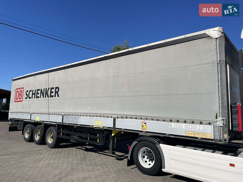 Тентованный борт (штора) - полуприцеп Schmitz Cargobull S01 2010 в Вараше фото Тентованный борт (штора) - полуприцеп Schmitz Cargobull S01 2010 в Вараше