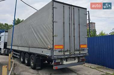 Бортовой полуприцеп Schmitz Cargobull S01 2000 в 