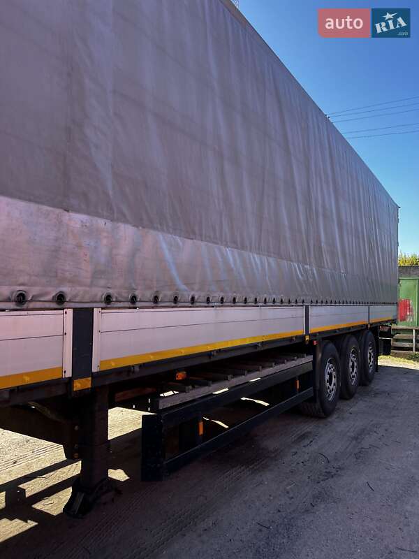 Бортовой полуприцеп Schmitz Cargobull S01 2001 в Мене