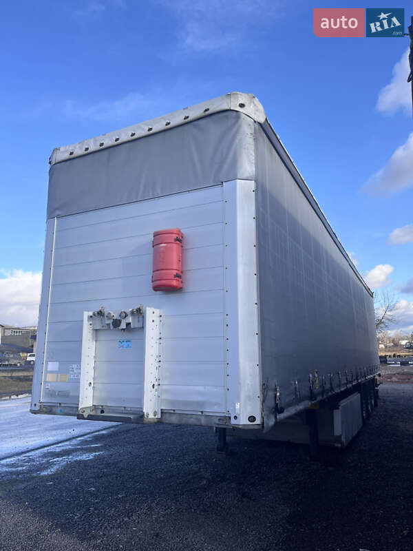 Тентованный борт (штора) - полуприцеп Schmitz Cargobull SCS 2009 в Хусте