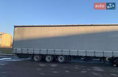 Тентованный борт (штора) - полуприцеп Schmitz Cargobull SCS 2010 в 