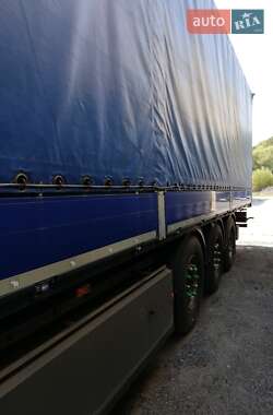Бортовой полуприцеп Schmitz Cargobull SO1 2014 в 