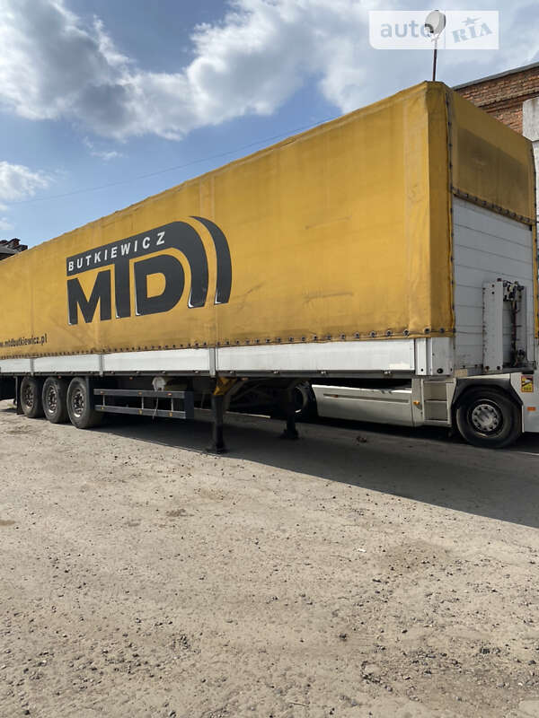 Тентованный борт (штора) - полуприцеп Schmitz S-01 2003 в Хмельницком фото Тентованный борт (штора) - полуприцеп Schmitz S-01 2003 в Хмельницком