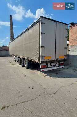 Бортовой полуприцеп Schmitz S-01 2004 в 