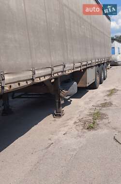 Бортовой полуприцеп Schmitz S-01 2004 в 