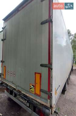 Бортовой полуприцеп Schmitz S-01 2006 в 